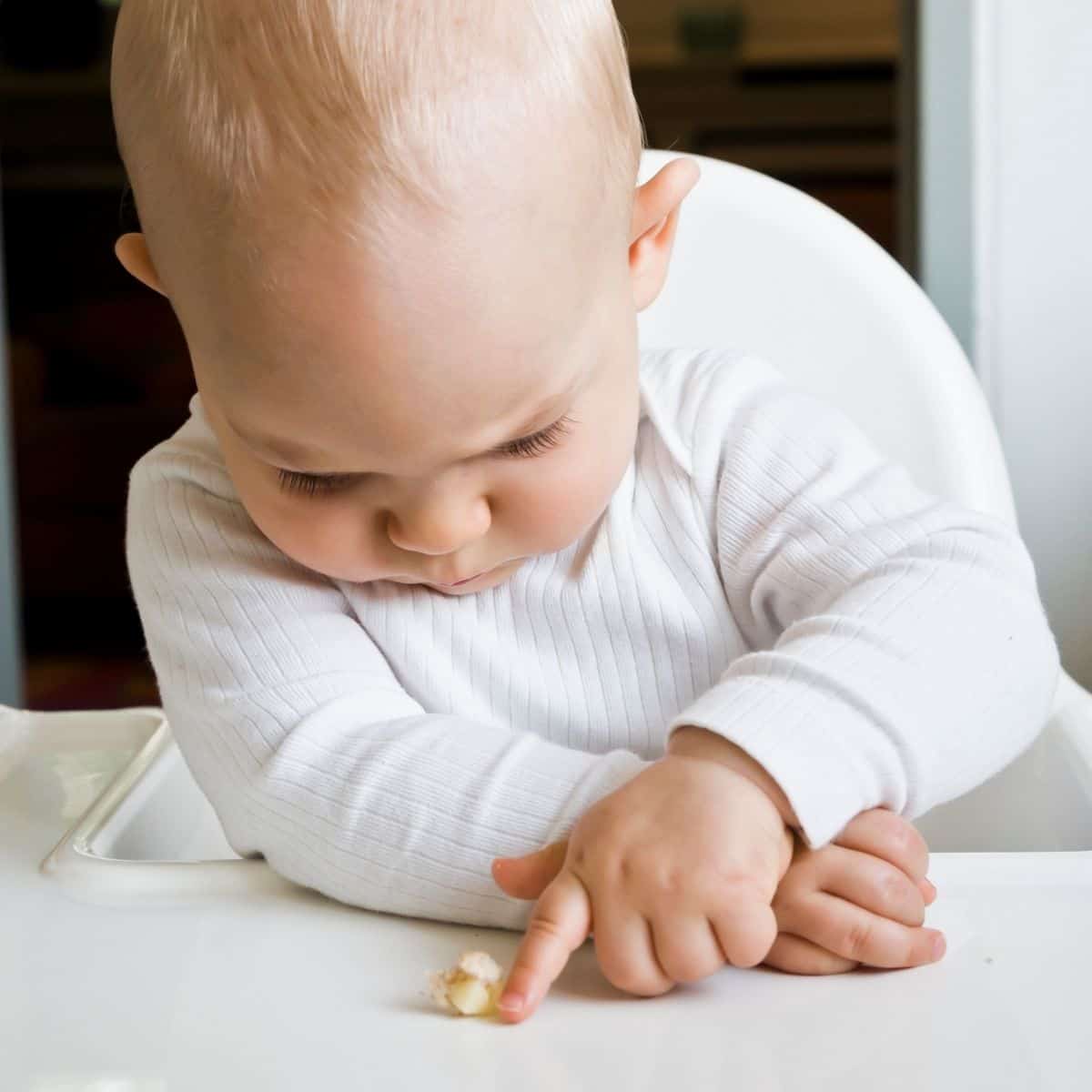 Children learning to feed themselves