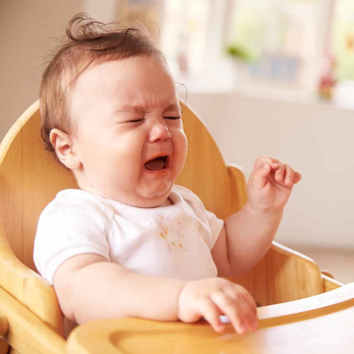 baby-cries-when-trying-to-feed-solids