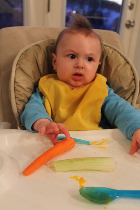 baby cries after eating solids