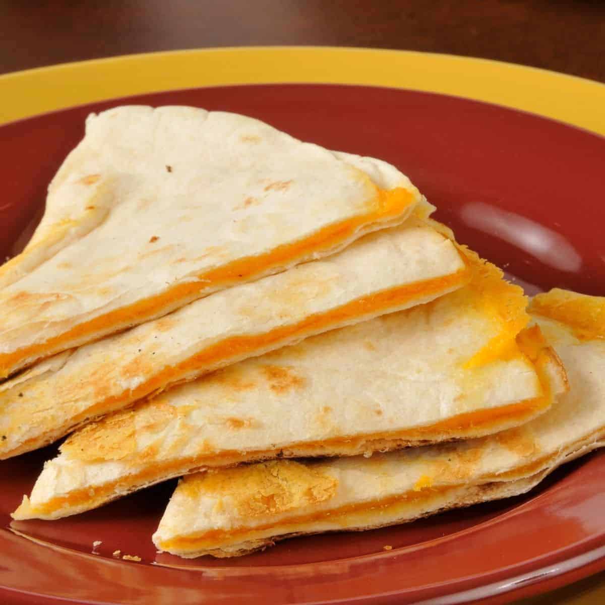 https://yourkidstable.com/wp-content/uploads/2018/08/Cheese-Quesadilla-4-1-1.jpg