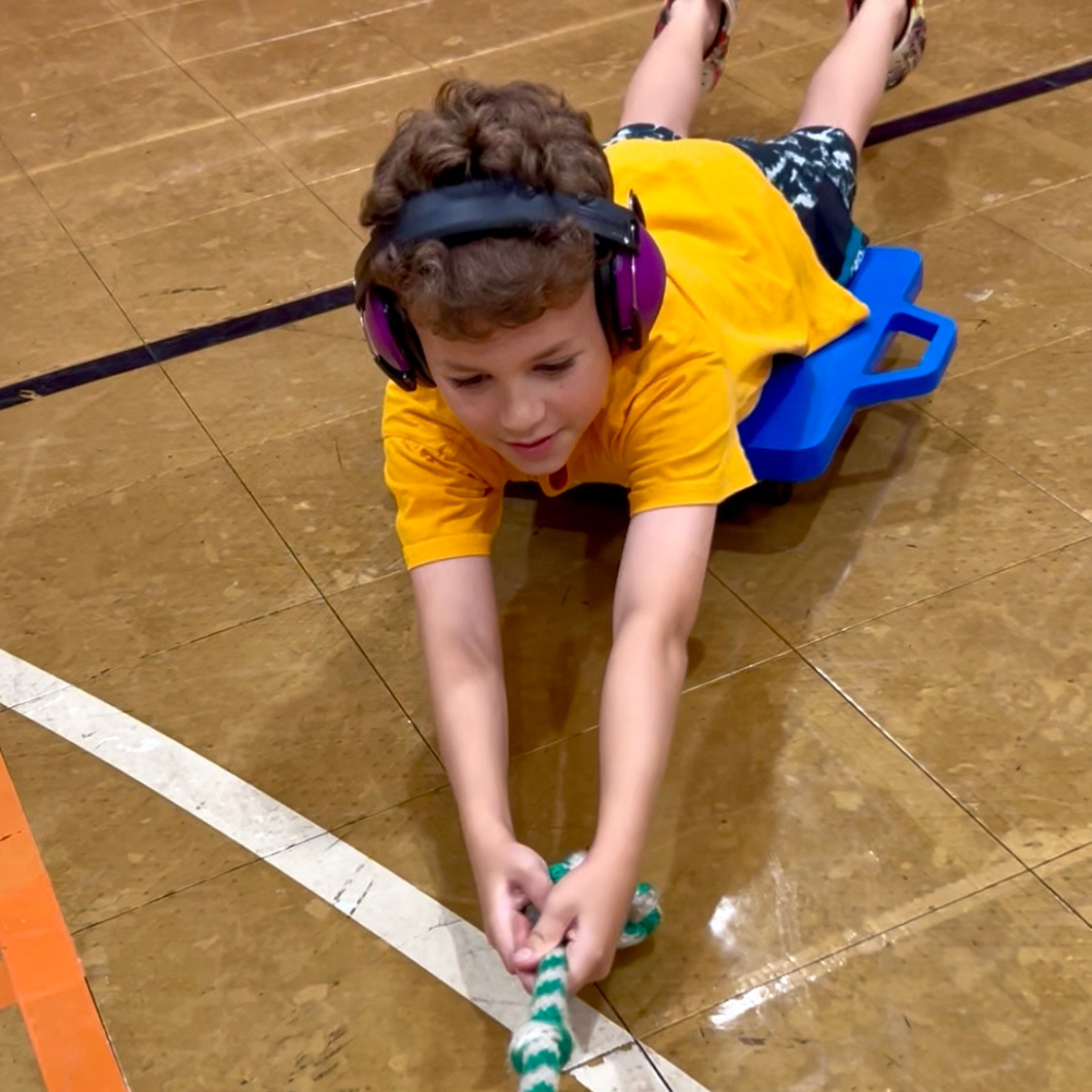 5 Ways to Use a Scooter Board for Sensory Input