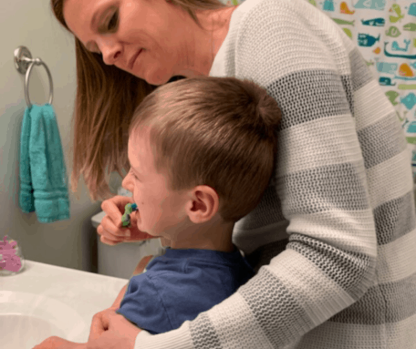 I hear from parents all the time, "Help, my child won't brush her teeth!"  Discover why and get 9 powerful tips to help your child move past the refusals, battles, and tantrums quick. Affiliate links used below. 