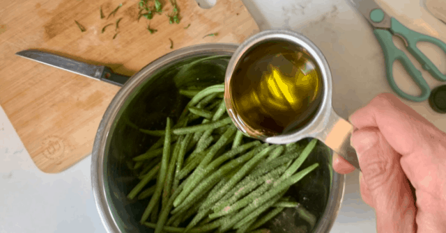 Try this crazy simple way to cook green beans for kids! Learn the special twist to preparing green beans so that your kid comes back for more. Perfect for picky eaters too, with just 5 minutes of prep time.  